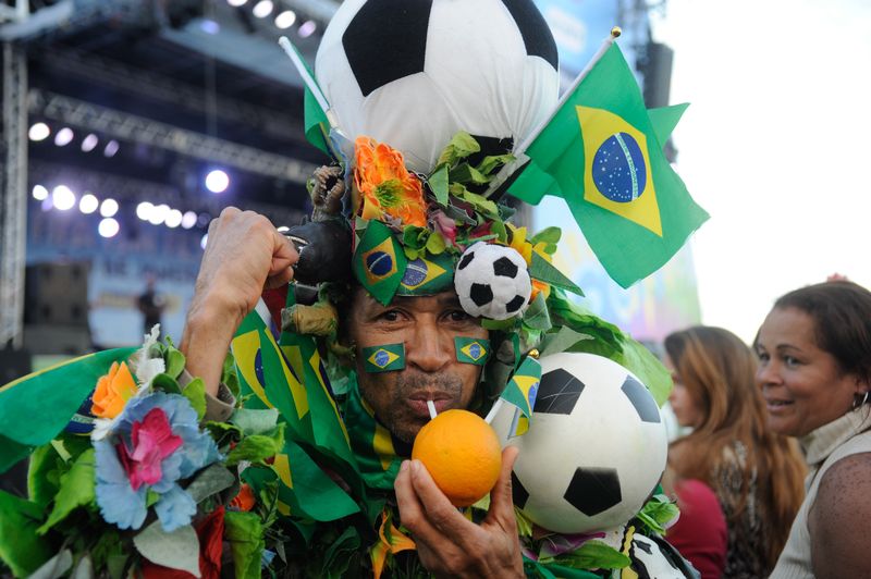 Torcedor enfeitado durante Fifa Fun Fest no Rio de Janeiro | Foto: EBC