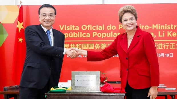 O primeiro-ministro da China, Li Keqiang, e a presidente do Brasil, Dilma Rousseff: negócios entre potências, a segunda e a sétima maiores do mundo, nunca são “ações entre amigos” | Roberto Stuckert Filho/PR
