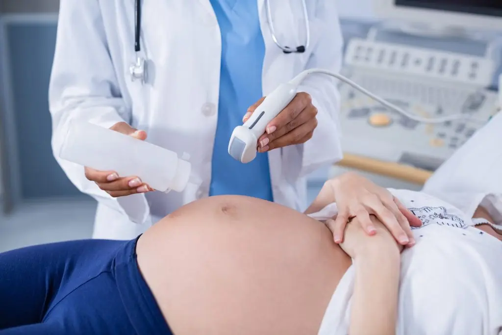 pregnant-woman-receiving-ultrasound-scan-stomach-1024x683